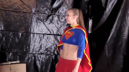 Kryptonite Surprise - Kryptonite Surprise
Starring Norah Nova
Directed by JohnM

Supergirl confronts the evil MaX CoXXX, but he is ready for her. As she nears, ready to bring him to justice, he surprises her with the largest piece of Kryptonite that she has ever seen. Weakened by the power-stealing crystal, she is helpless against the might of MaX. Pushing her down into a chair, he threatens her with the phallic shaped shard, poking her in belly, exposing her pert boobs and nearly bare pussy, shoving it between her virginal butt cheeks and threatening to fuck her with it. Never in such a vulnerable position before, her reserve crumbles and she becomes a pliant and terror-stricken submissive. MaX laughs as he sees how wet her pussy is becoming as he roughly grinds his hand against her most private parts, her body betraying the superheroines once brave demeanor.

High on his new found power, Max pulls out his stiff shaft and orders the Kryptonian to suck it. What choice does she have? Full lips that would have never said surrender now part, her innocent mouth now crammed with the villains hot and throbbing cock. Growing weaker by the second, Max yanks Supergirl out of her chair by her neck, corralling her like a naughty child. Bending her over unceremoniously, MaX flips her cape and skirt up, pulling her panties to the side and shoves himself into her from behind. Supergirls mouth gapes open, moaning and drooling with lust, the villainous shaft pummeling her again and again, each brutal thrust stretching her cunt out until she begs him to stop. The many orgasms are merely an added humiliation. For the ultimate debasing, her arch-enemy grips her shapely hips and, with a triumphant grunt, unloads his ball sack into her defiled womanhood. Beaten and broken, Supergirl whimpers, as MaX gloats about keeping her as a weakened cock-slut, to be passed around by the most vile villains for the rest of her days. Then, realizing that the fatal flaw of all super villains is leaving their nemesis alive.

Using the large piece of Kryptonite, he puts Supergirl in a choke hold with it, her feeble struggles wild and desperate. Eyes becoming unfocused, gasping for the air she now needs in her Kryptonite-poisoned state, her flailing soon slows to her final twitches and convulsions. Limp and lifeless, MaX leaves the defeated superheroine on the floor of his dirty lair, her abused breasts and still dripping pussy exposed for all to see. An ignoble end for such a young hero.   
 
Fetish Elements:Explicit Sexual Content, Partial Nudity, Disheveled, Sex, Superheroine, Costume, Boots, Tickle Torture, Blowjob, Doggy-Style, Strangling, Body Play, Body Views, Foot Views.

Note: Actresses are over 18 at the time of filming and the word "teen", "teenage", "young girl" is only meant to imply legal age characters regardless of audience interpretation.

PKF Studios adheres to USC 2257 record keeping requirements.

1920X1080 HD Quality MP4 Format